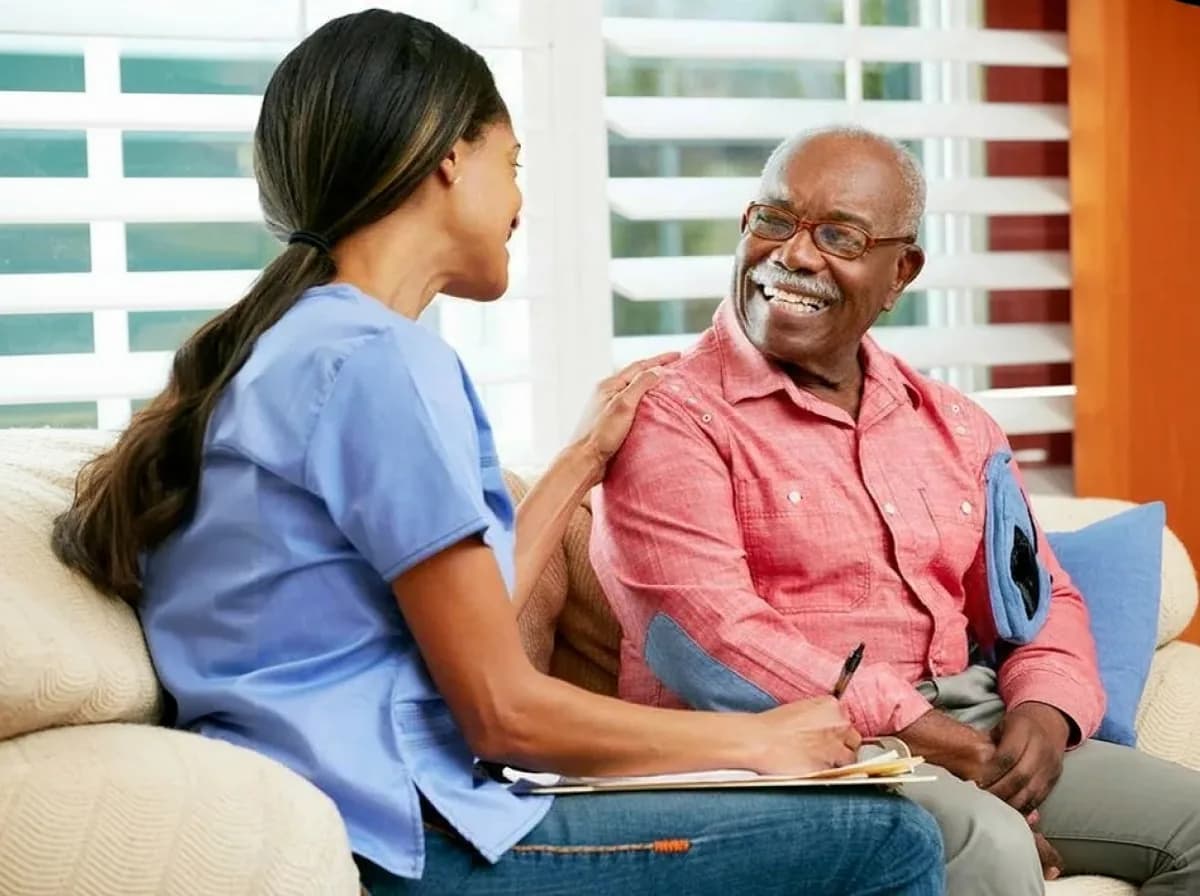 A Focus Family Care caregiver providing around-the-clock 24-hour home care to a senior